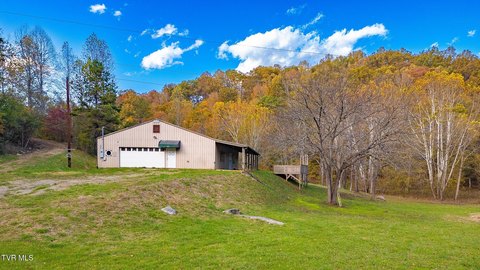 Secluded Mountain Land with Building