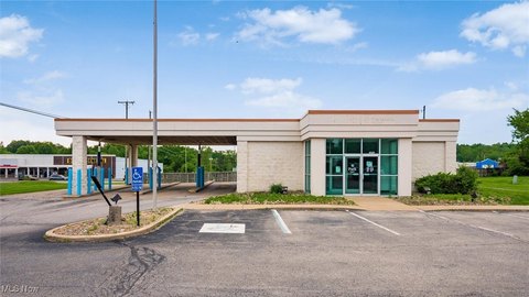 High-Visibility Commercial Building with Acreage