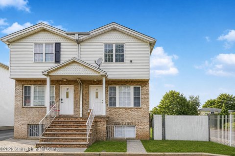 Two-Family Semi-Detached Home with Yard