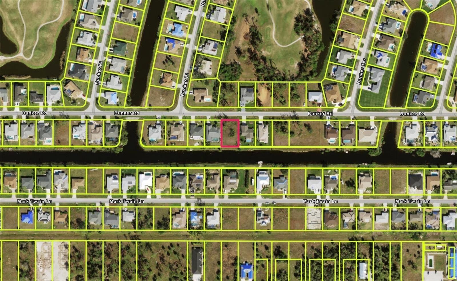 Canal-Front Lot in Golf Community