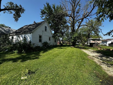 LAND - Justice, IL