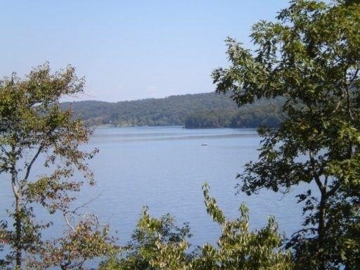 Land with Mountain and Lake Views