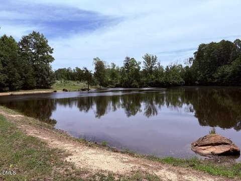 Roxboro Wooded Land with Pond