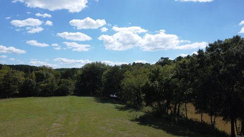Story, AR Land by Creek