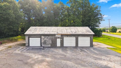 Fenced Auto Shop Building