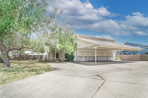 Two-Story Fourplex with Carport