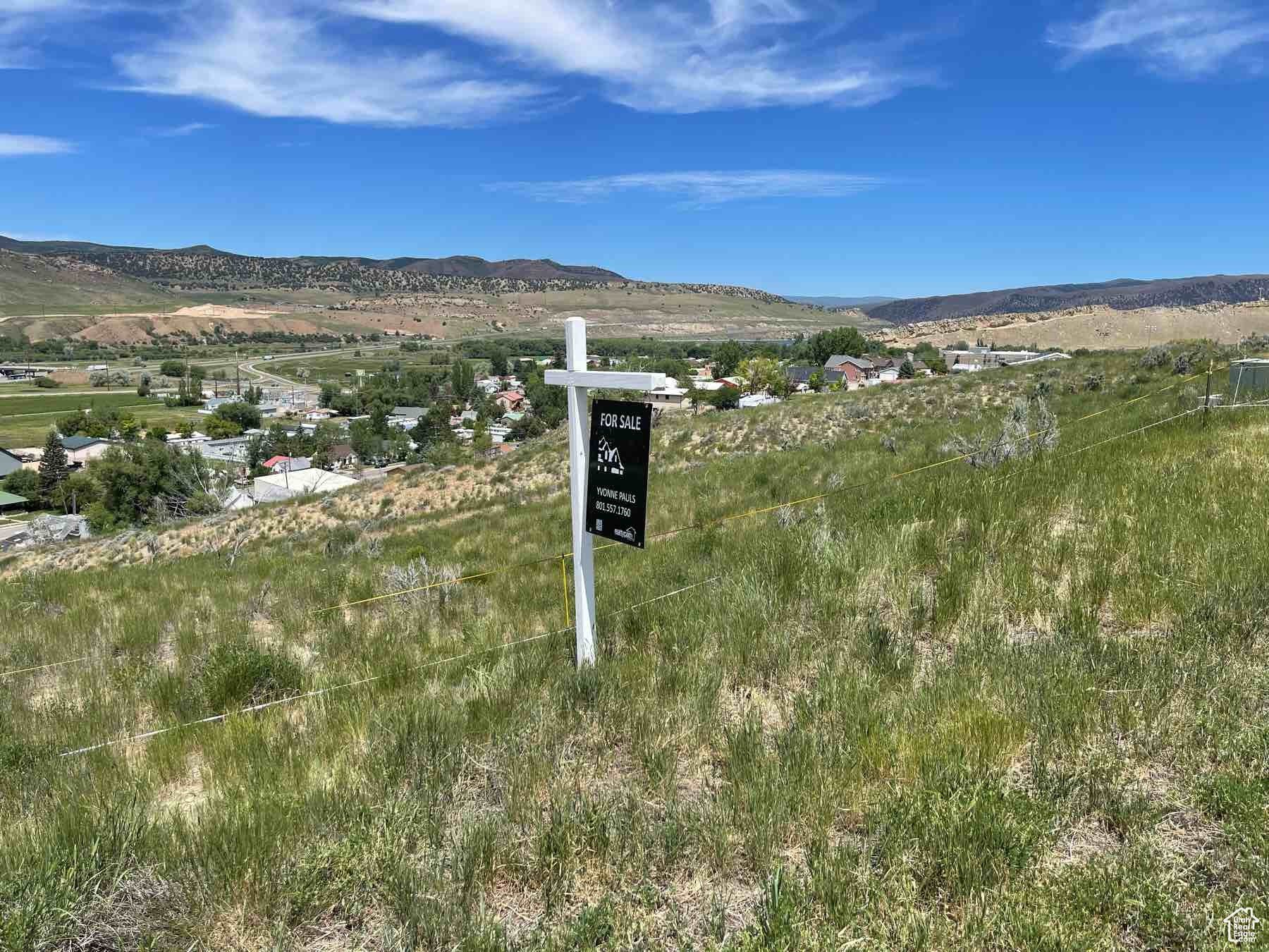 Land with Mountain and Valley Views