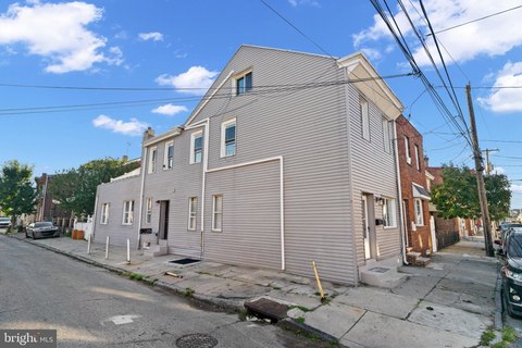 Legal Triplex with Finished Basement