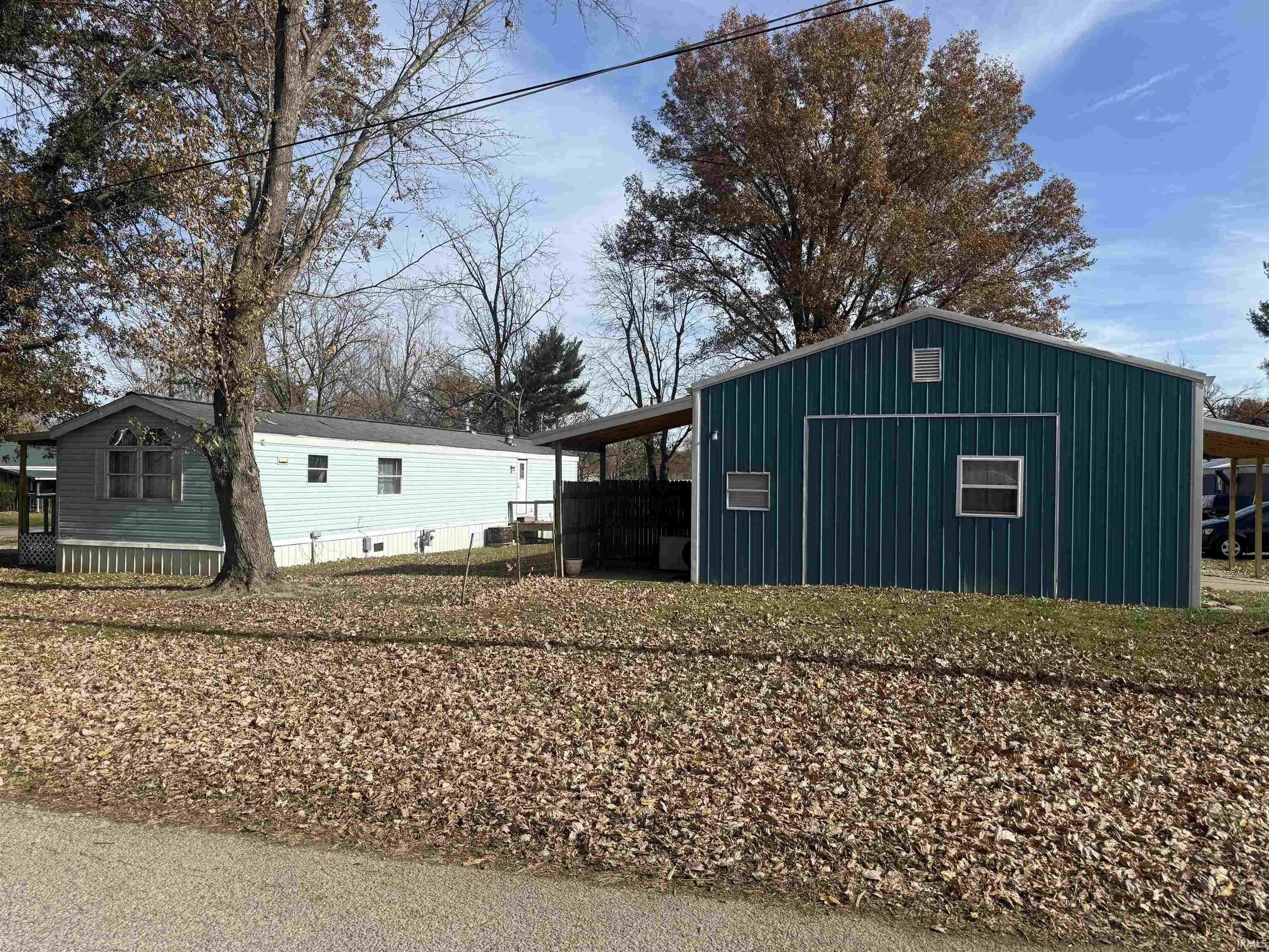 Income-Generating Mobile Home and House