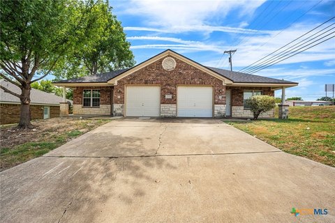 Six-Bedroom Duplex with Garages