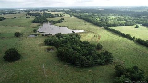 55.9 Acres with Stocked Pond