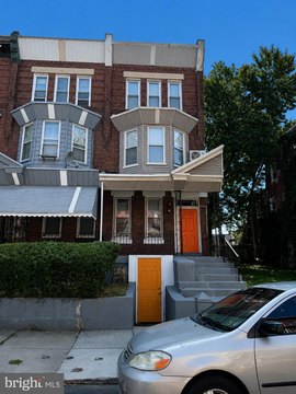 Five-Unit Apartment Building with Expansion Potential