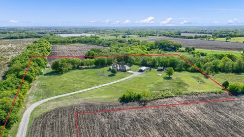 Unrestricted Land with Existing Residence