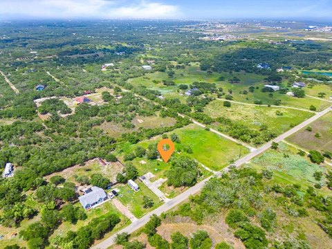 Fenced Residential Acreage with Concrete Entry