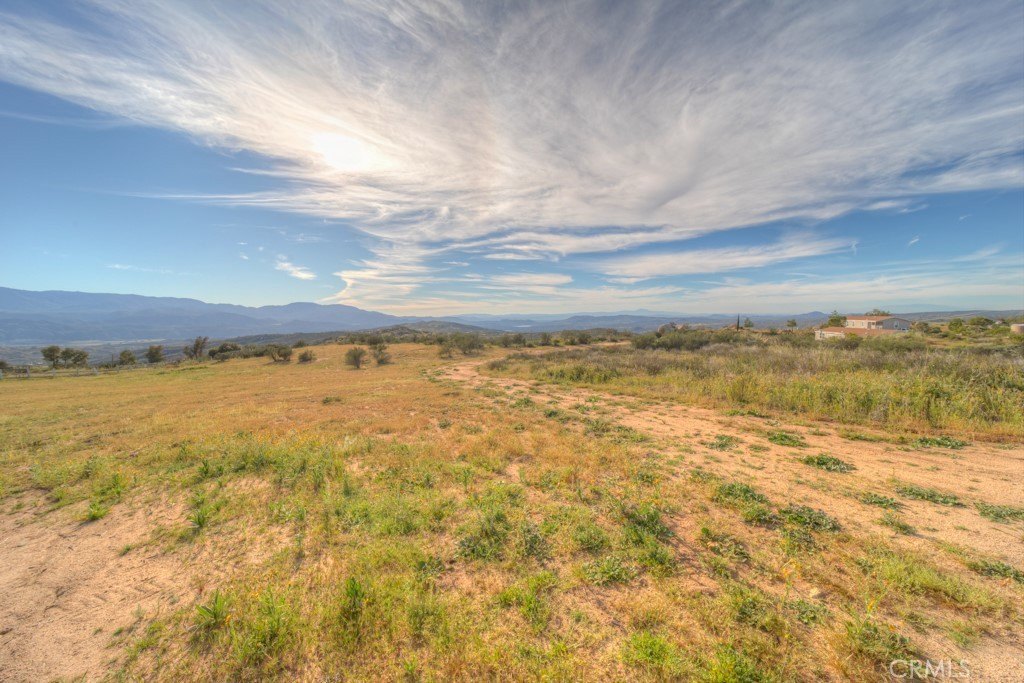 Land with Mountain and Lake Views