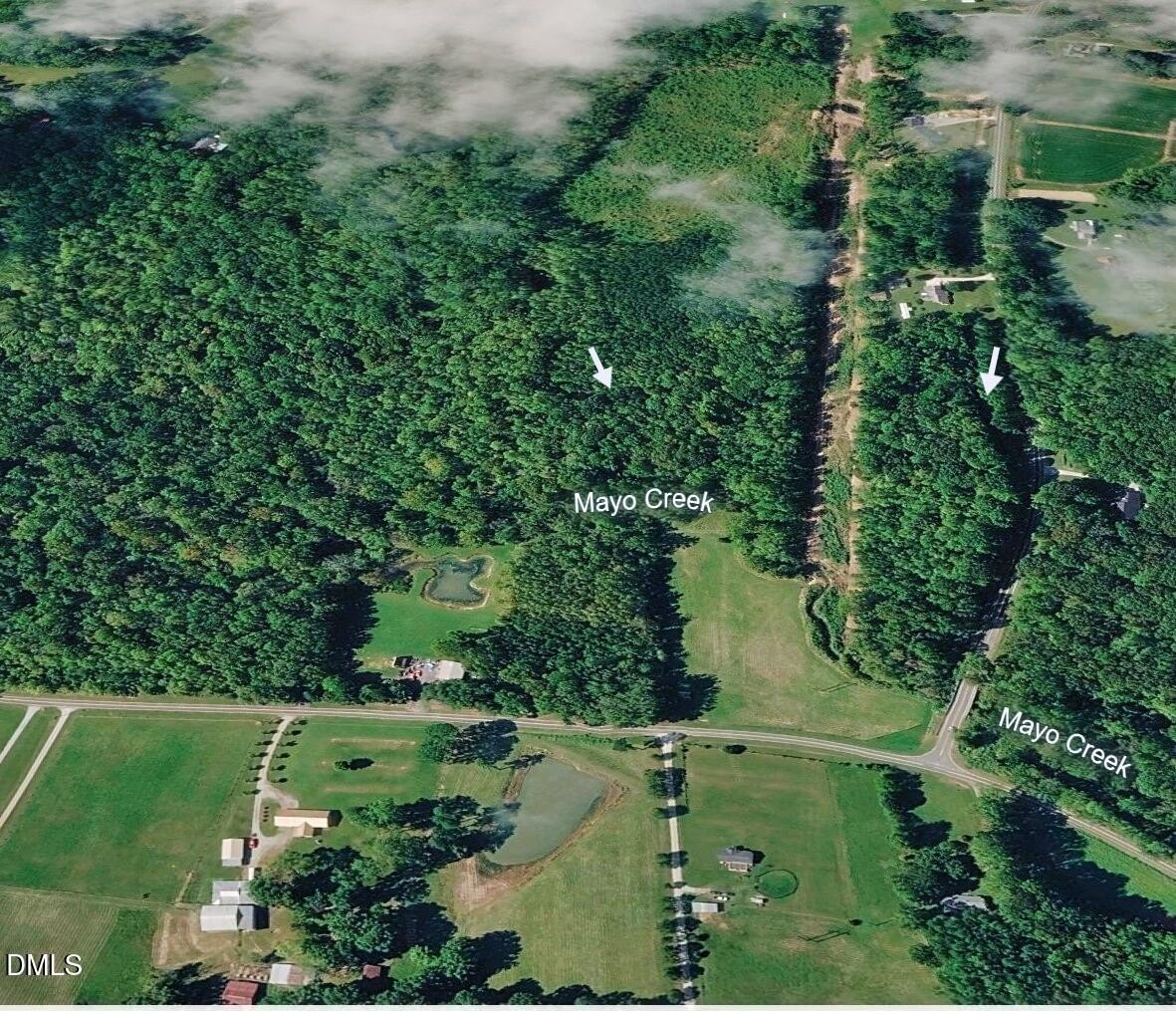 Roxboro Acreage with Creek Border