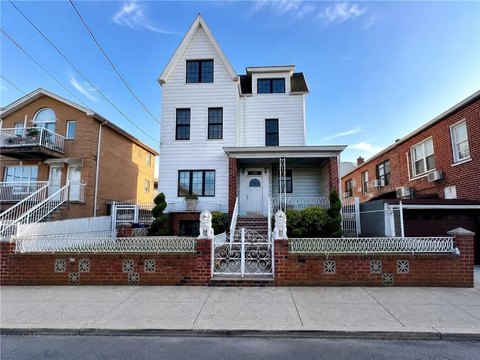 Detached Three-Family Home with Driveway