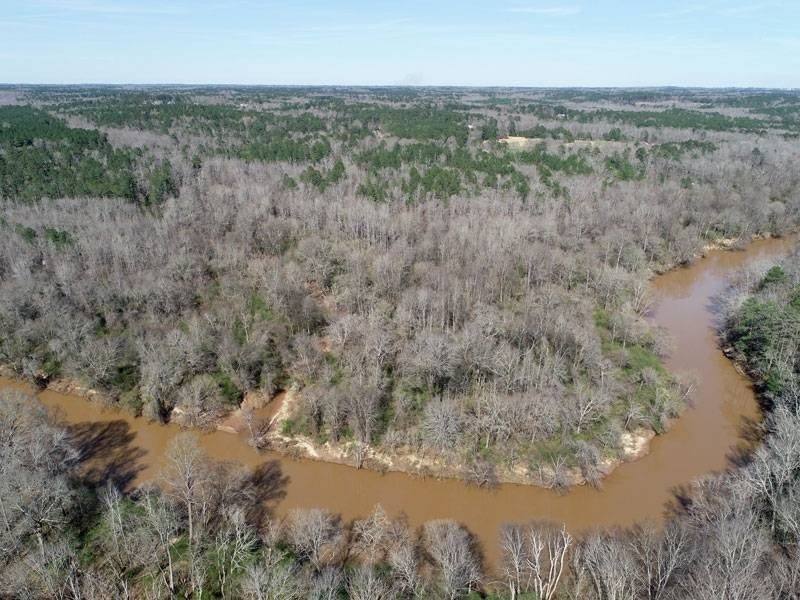 Wooded Land with River Frontage