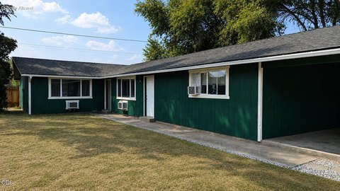 Single-Level Duplex with Carports