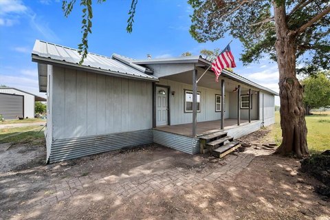 Working Ranch with Farmhouse