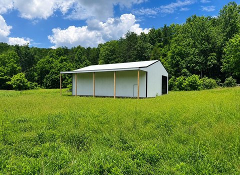 Unrestricted Waterfront Land with Pole Barn
