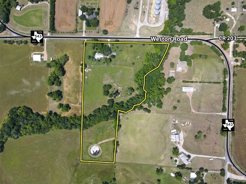 Unrestricted Acreage with Farm Improvements