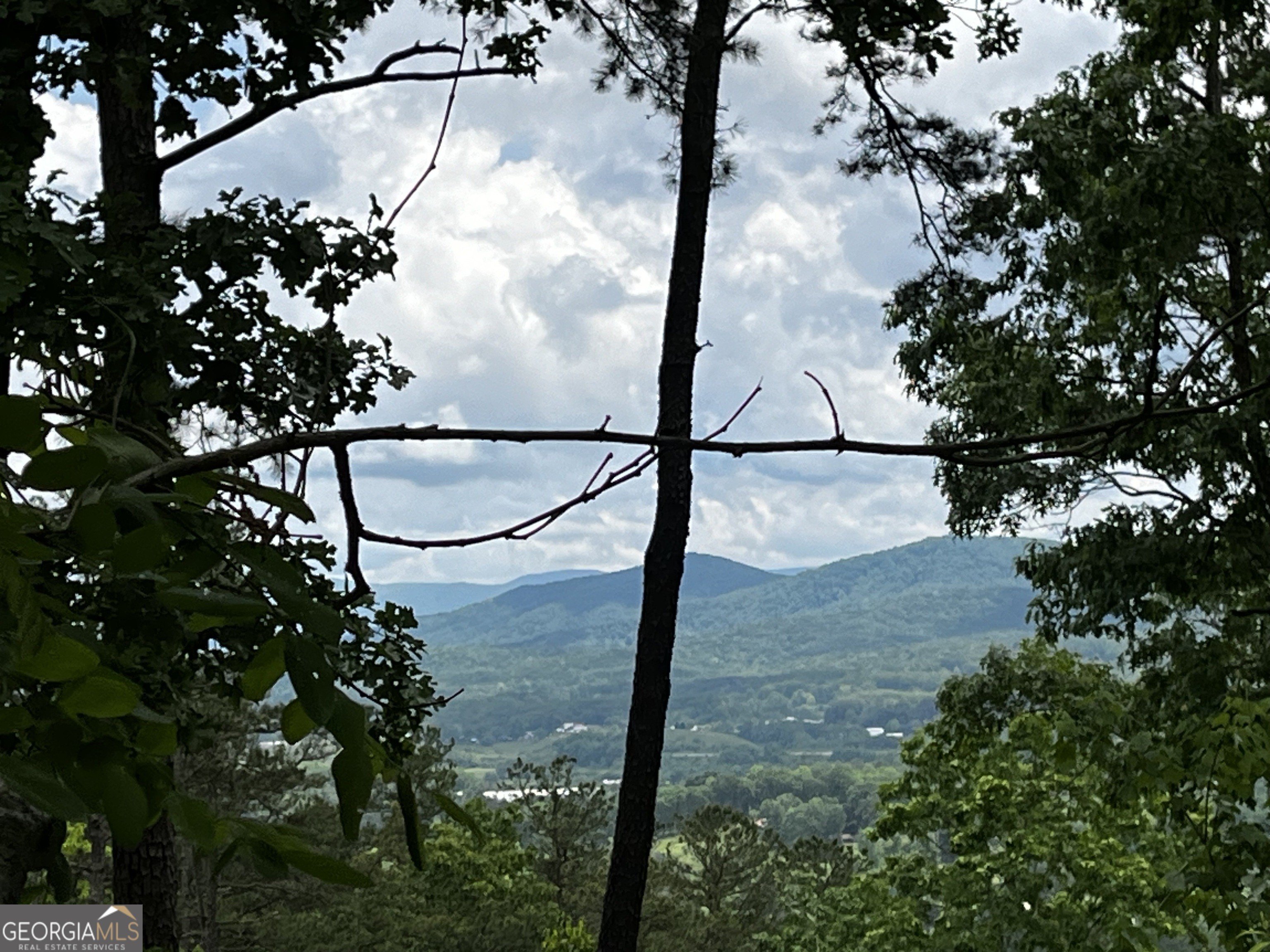 Land with Mountain and Lake Views