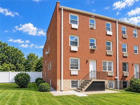 Brick Triplex With Private Driveway