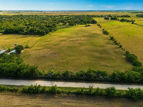 Wooded Farmland Tract with Stock Tank