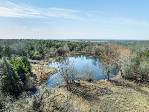 Fenced Farmland Tract with Pond