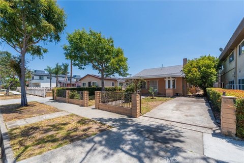 Tenant-Occupied Quadplex with Garages