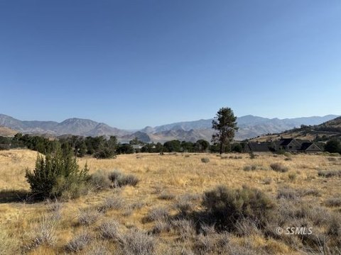 Land with Lake and Mountain Views