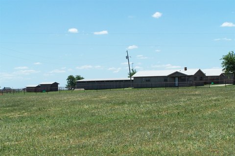 Land with Homes and Barns