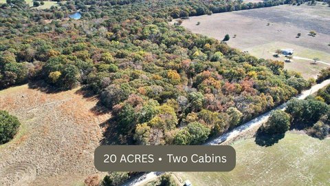 Land with Two Cabin Homes