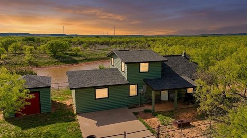 Wooded Ranch with Stock Tanks
