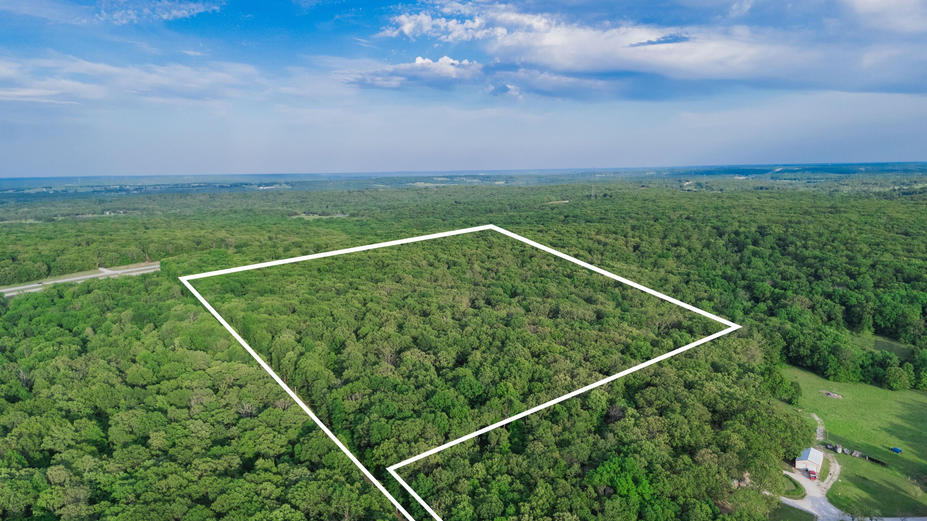 Secluded Wooded Land in Dunnegan, MO