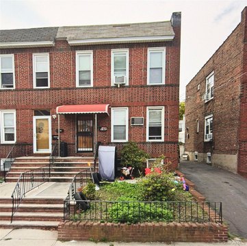 Brick Triplex with Driveway