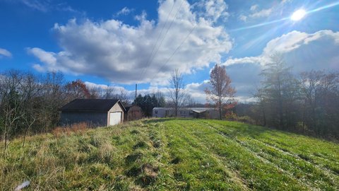 Secluded Wooded Acreage in Owenton