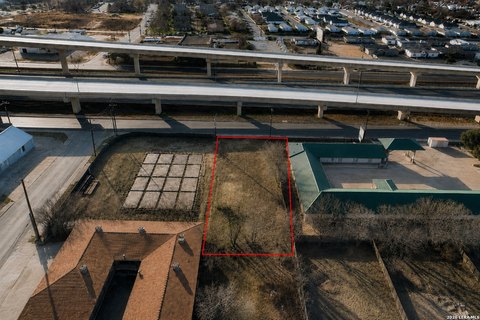 Fenced Commercial Potential Lot