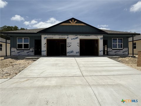 Duplex Under Construction with One-Car Garages