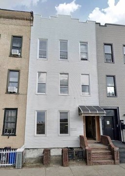 Fully Renovated Three-Family Home