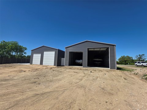Secure Metal Warehouse with Overhead Doors