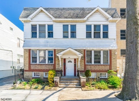 Four-Family Fixer-Upper Opportunity