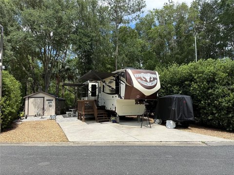 Deeded RV Lot with Wooded Backdrop