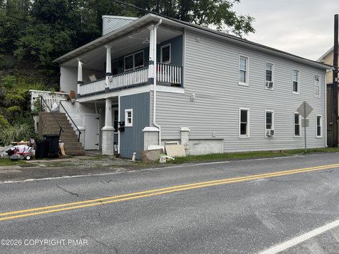Canal-View Duplex with Large Porch