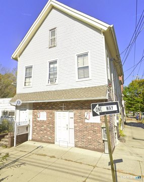 Mixed-Use Triplex with Redevelopment