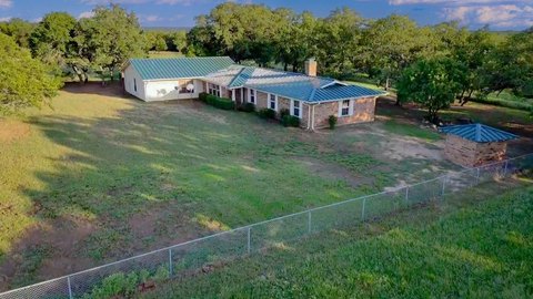 Acreage with Stocked Pond and Home