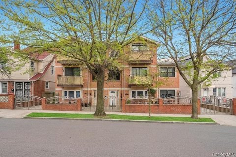 Jamaica Hills Three-Family Brick Residence