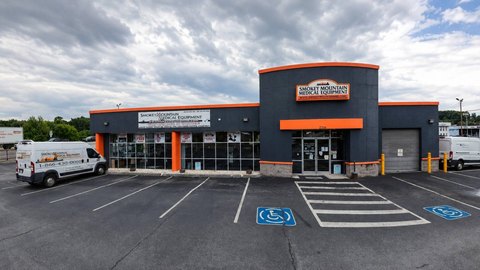 Corner Flex Showroom with Garage Bays