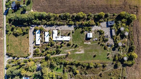 Expansive Land with Multiple Buildings